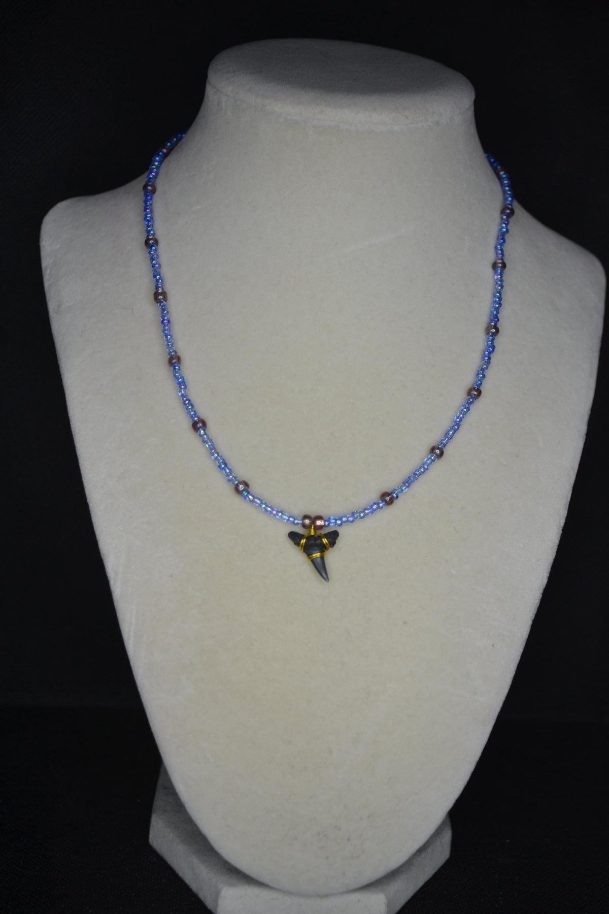 Wire wrapped sharks tooth beaded necklace. Blue and amethyst