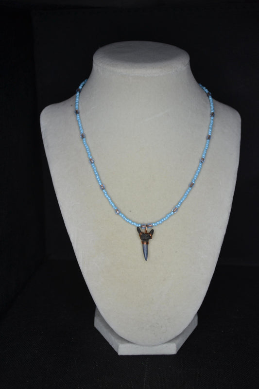 Wire wrapped sharks tooth beaded necklace. Silver and blue