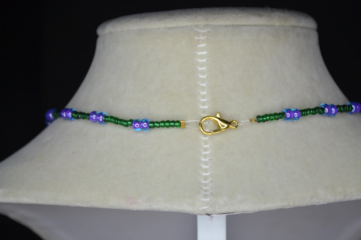 Gold Palm tree pendant glass bead choker. Green and blue violet