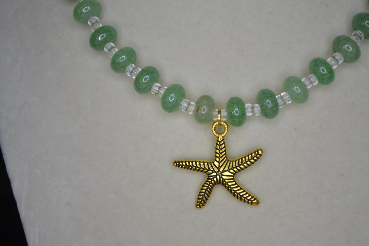 Gold Starfish pendant glass bead choker. Cracked green