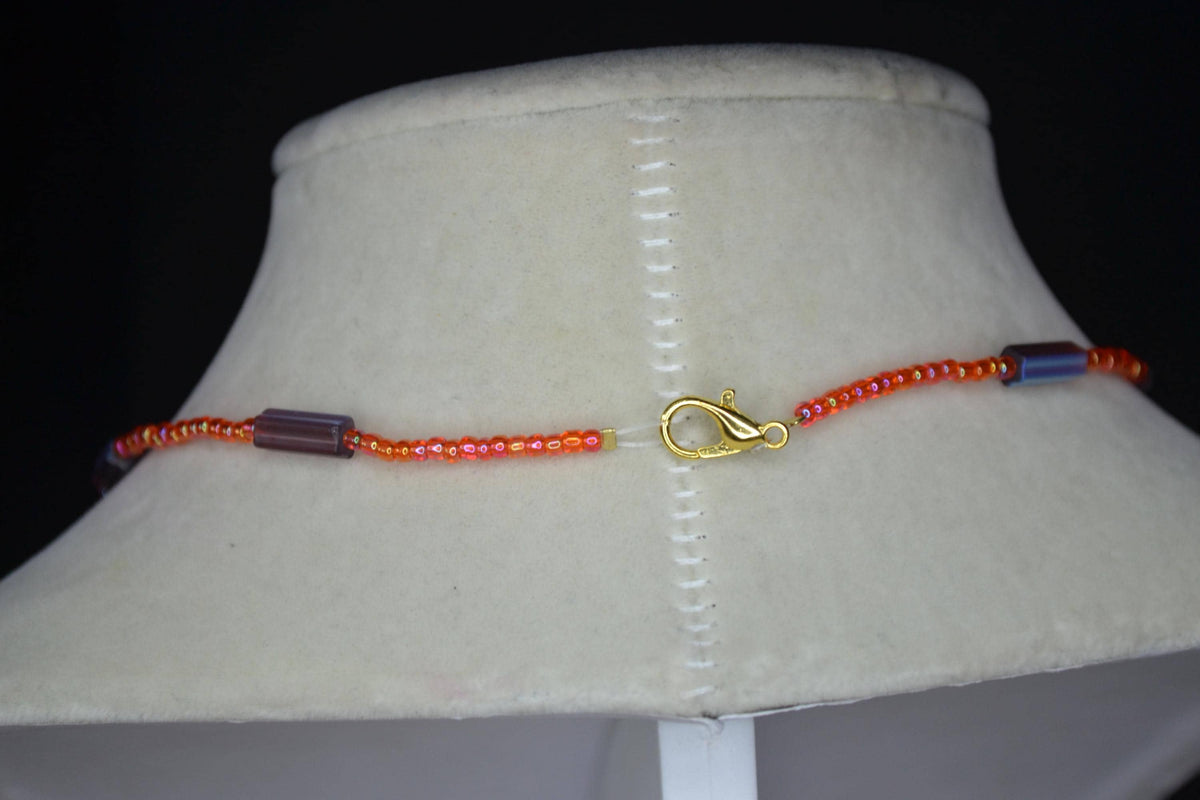Black cat in pumpkin pendant glass bead choker. Orange and metallic amethyst