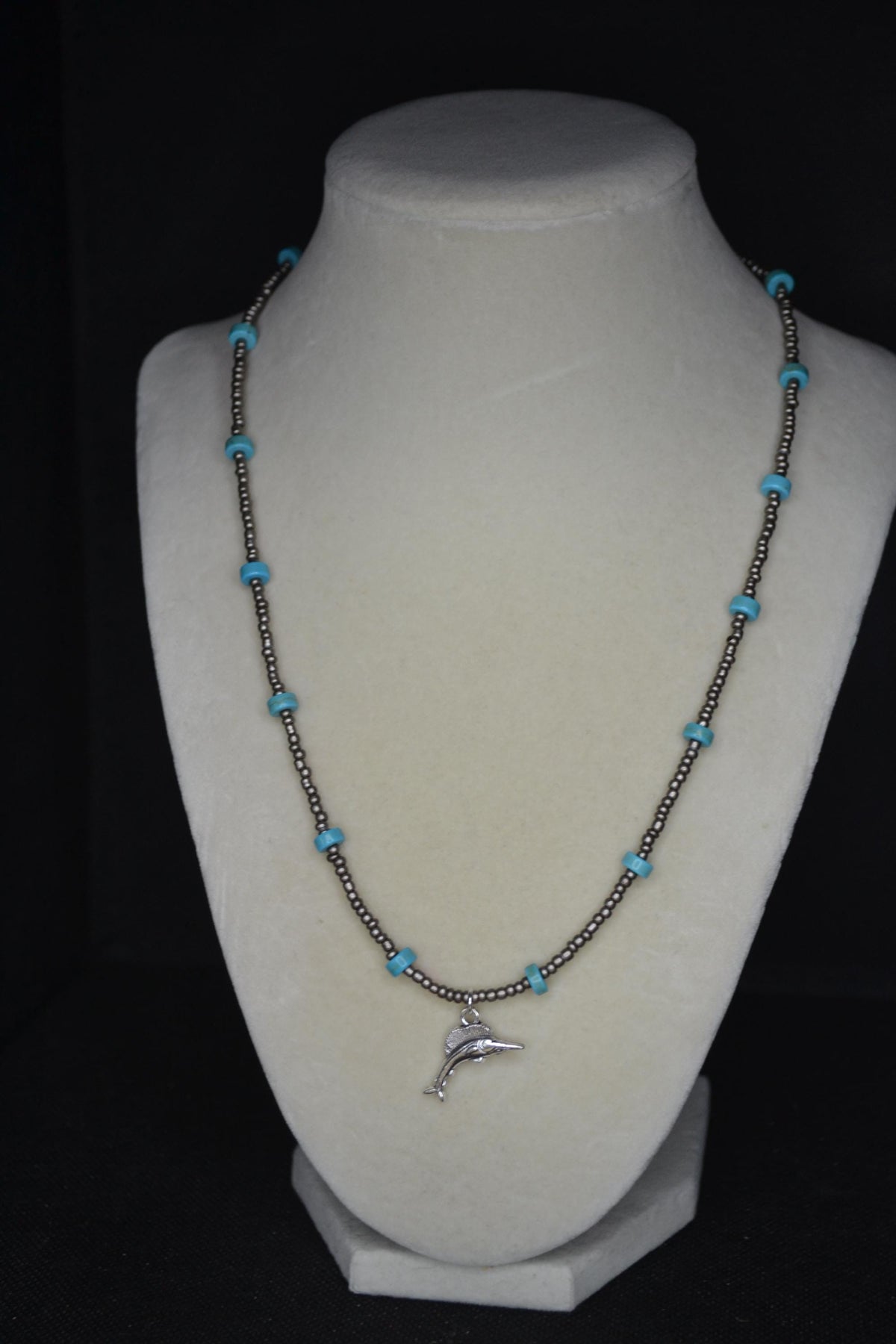 Silver swordfish pendant glass bead necklace. Metallic grey and turquoise