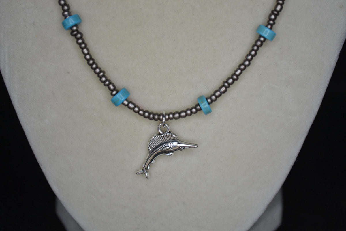 Silver swordfish pendant glass bead necklace. Metallic grey and turquoise