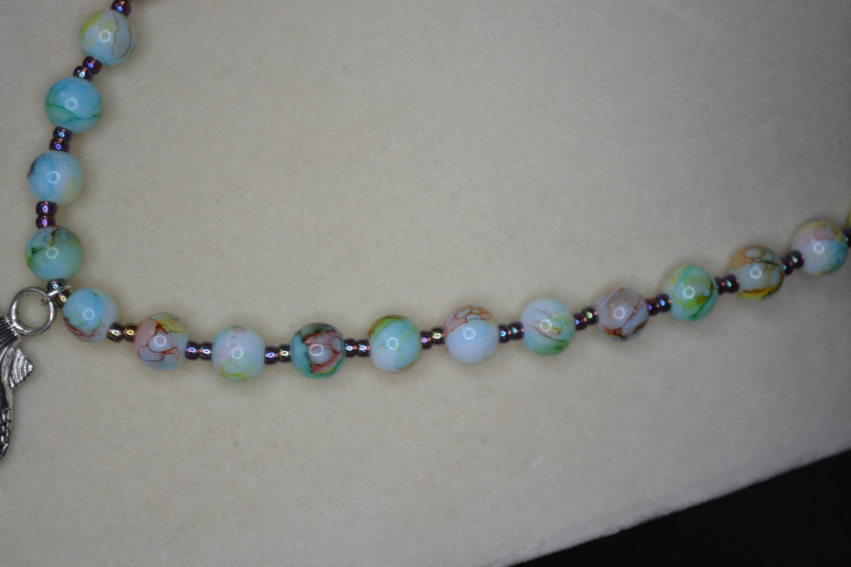 Silver sea shell pendant glass bead necklace. Confetti and metallic black