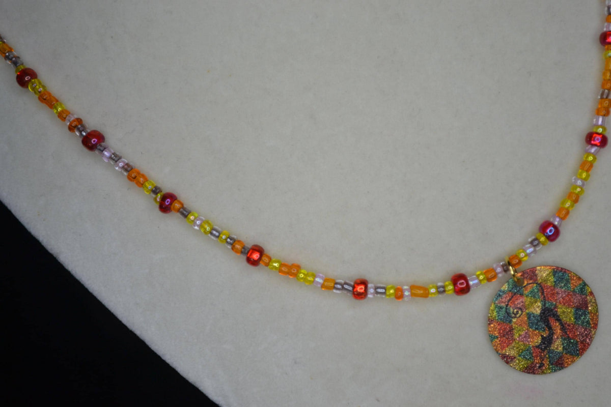 Vintage black cat pendant glass bead choker. Reds and oranges