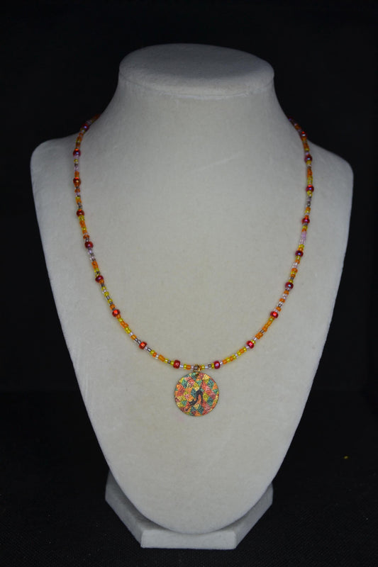 Vintage black cat pendant glass bead choker. Reds and oranges