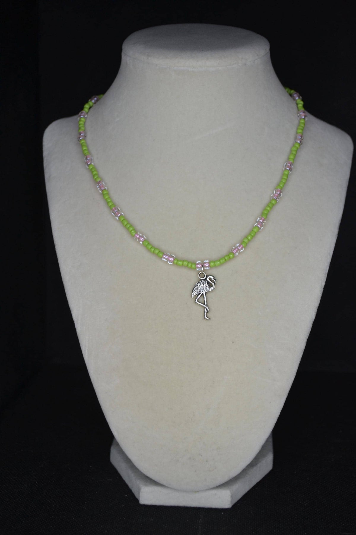 Silver Flamingo pendant glass bead necklace. Green and pink