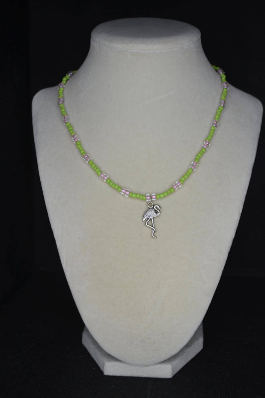 Silver Flamingo pendant glass bead necklace. Green and pink