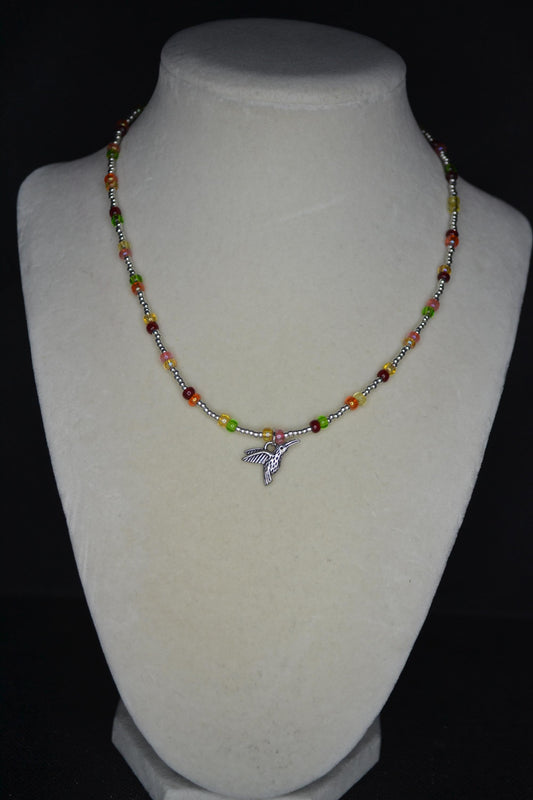 Silver Hummingbird pendant glass bead choker. Silver and skittles