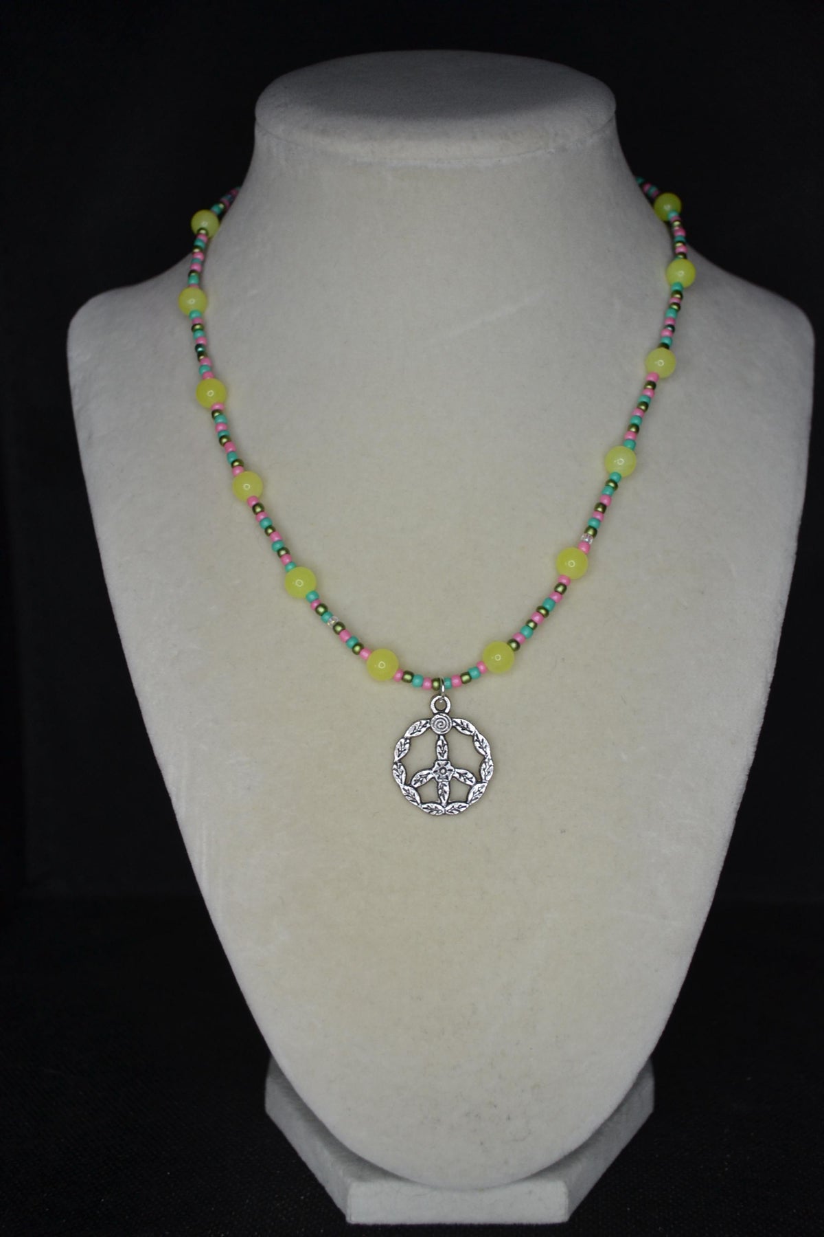 Silver Peace Sign pendant glass bead necklace. Yellow, teal, pink, and green