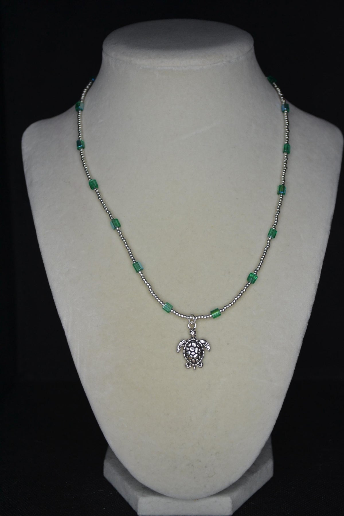 Silver Turtle pendant glass bead necklace. Aqua and silver