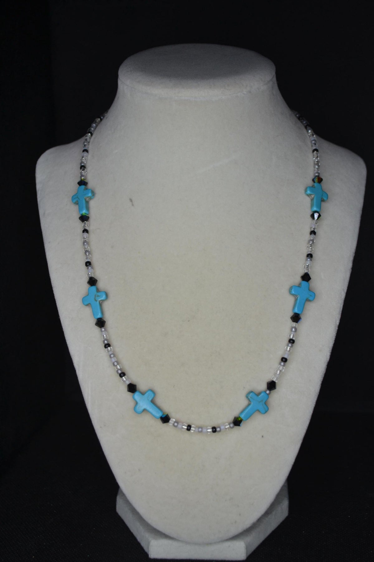 Beaded Cross glass necklace. Turquoise, white, and black