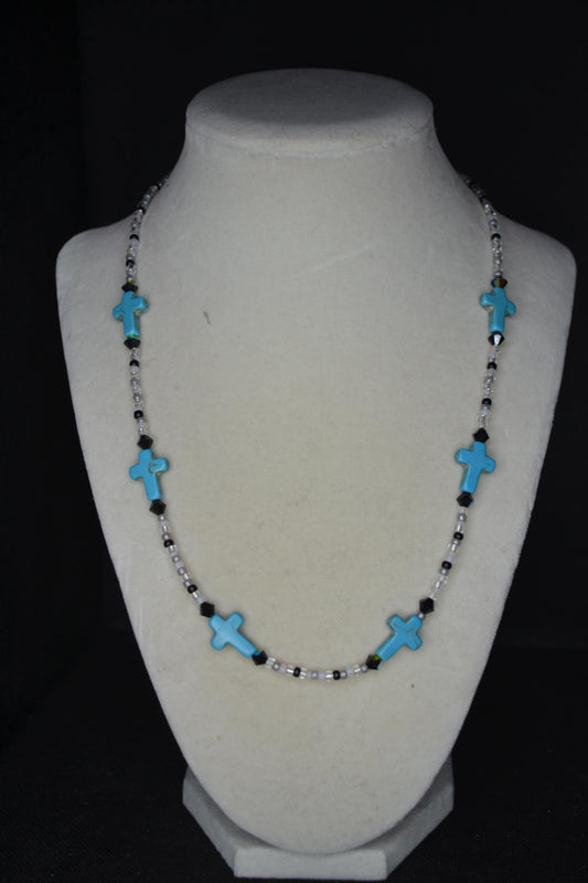 Beaded Cross glass necklace. Turquoise, white, and black