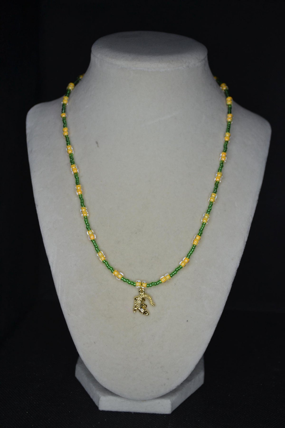 Gold alligator pendant glass bead necklace. Green and yellow