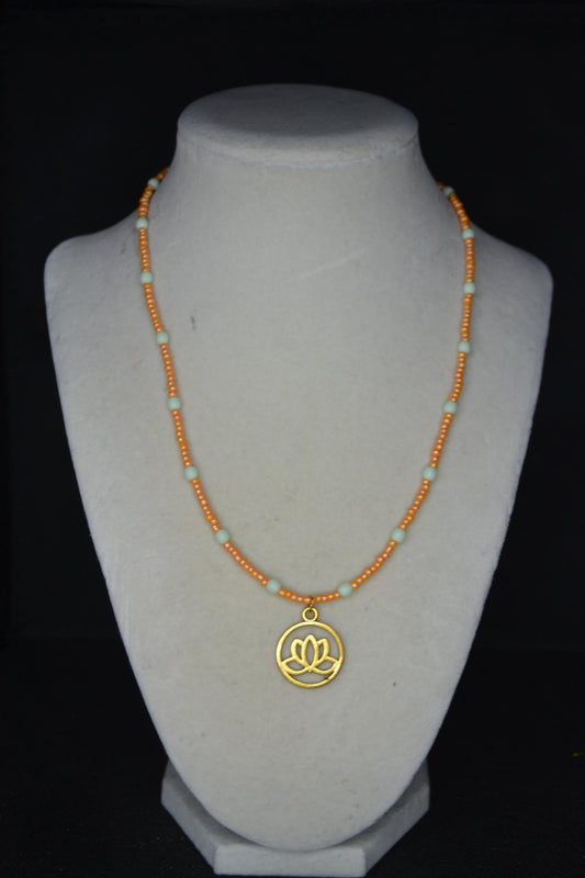 Gold Lotus pendant glass bead necklace. Mint and tangerine