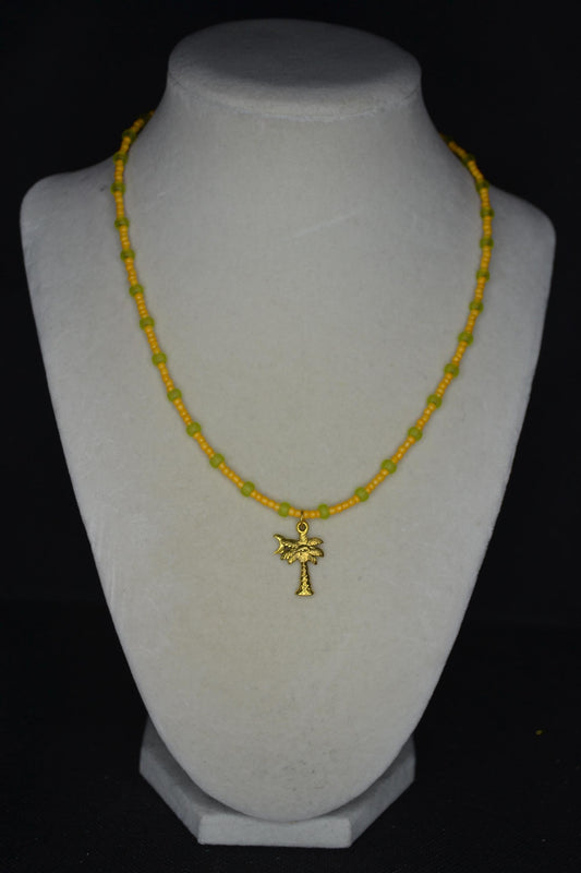 Gold palm pendant glass bead necklace. Tangerine & frosted green