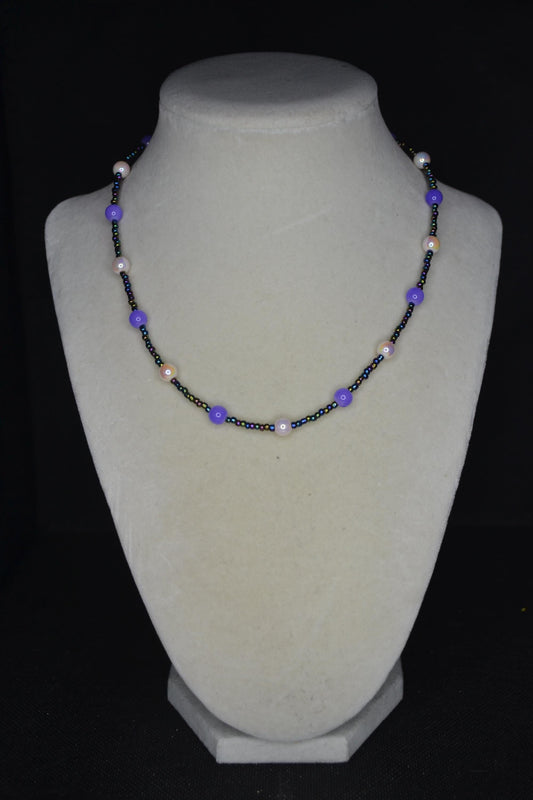 Multicolor glass bead necklace. Pearlescent white, purple. and oil spill