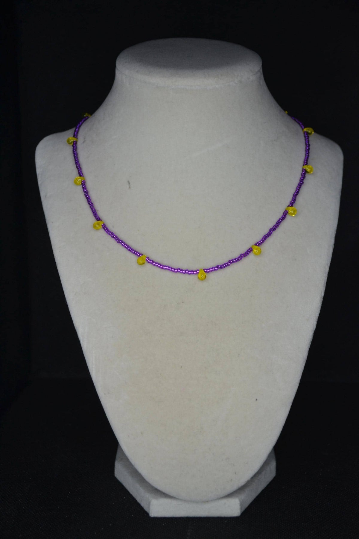 Multicolor glass bead necklace. Purple and yellow drops