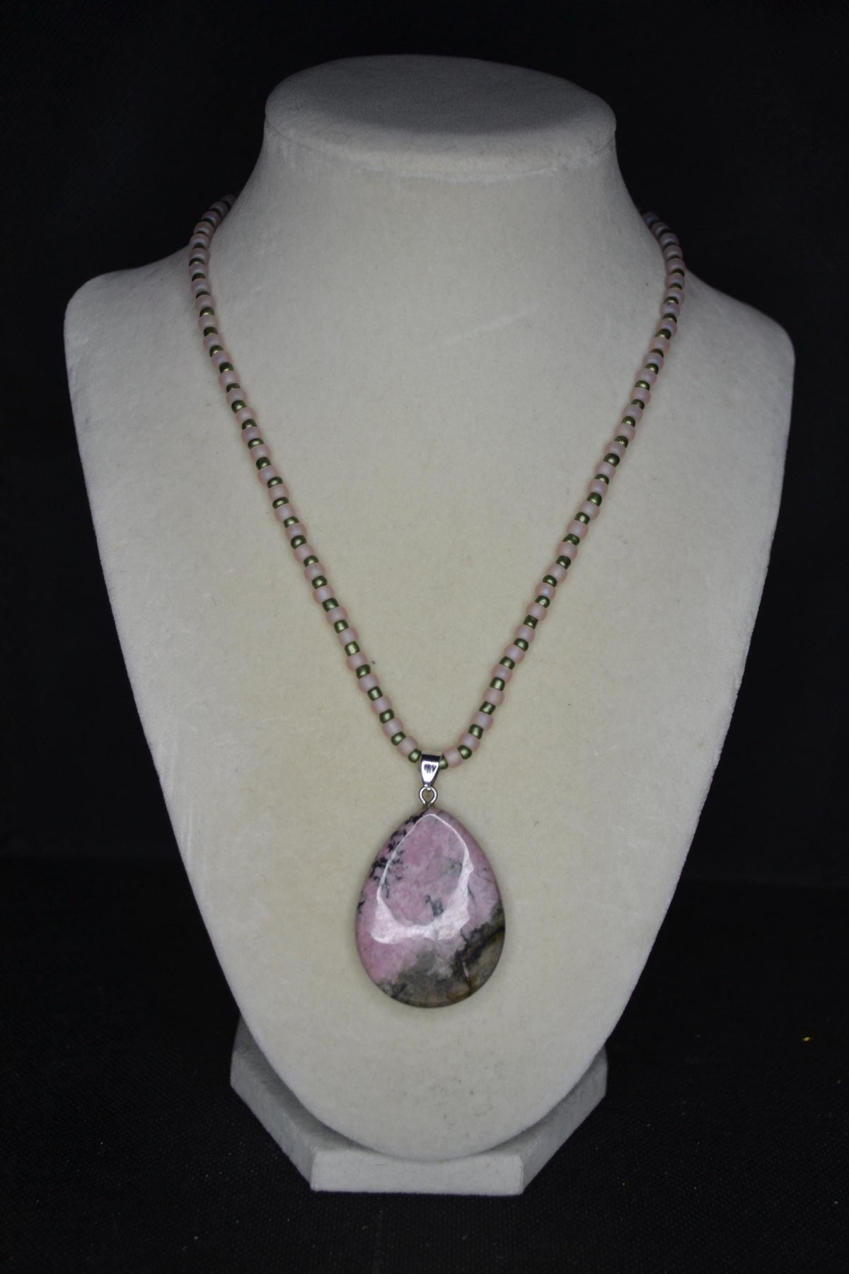 Rhodonite pendant glass bead necklace. Frosted pink & Metallic green