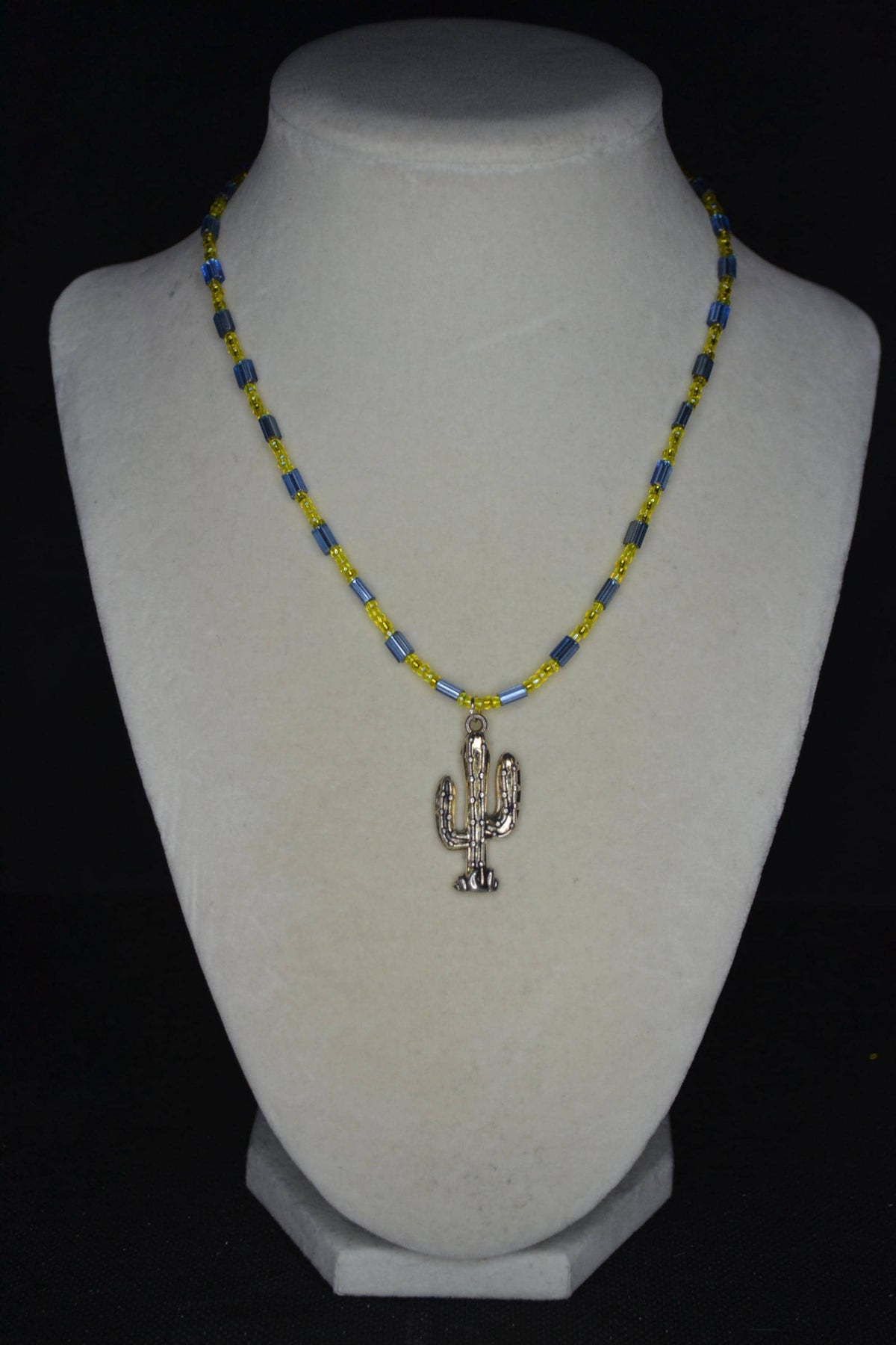 Silver Cactus pendant glass bead necklace. Yellow and blue