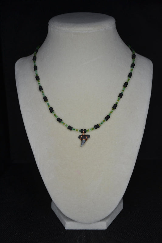 Wire wrapped sharks tooth beaded necklace. Frosted greens and matte black