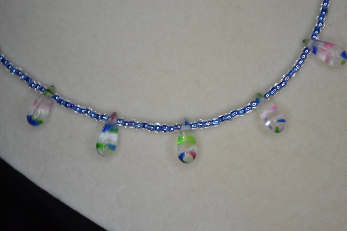 Multicolor glass bead necklace. Sea blue and tie dye drops