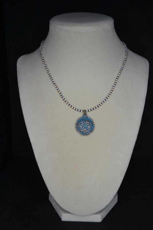 Bronze Sand dollar pendant glass bead necklace. White and bronzes
