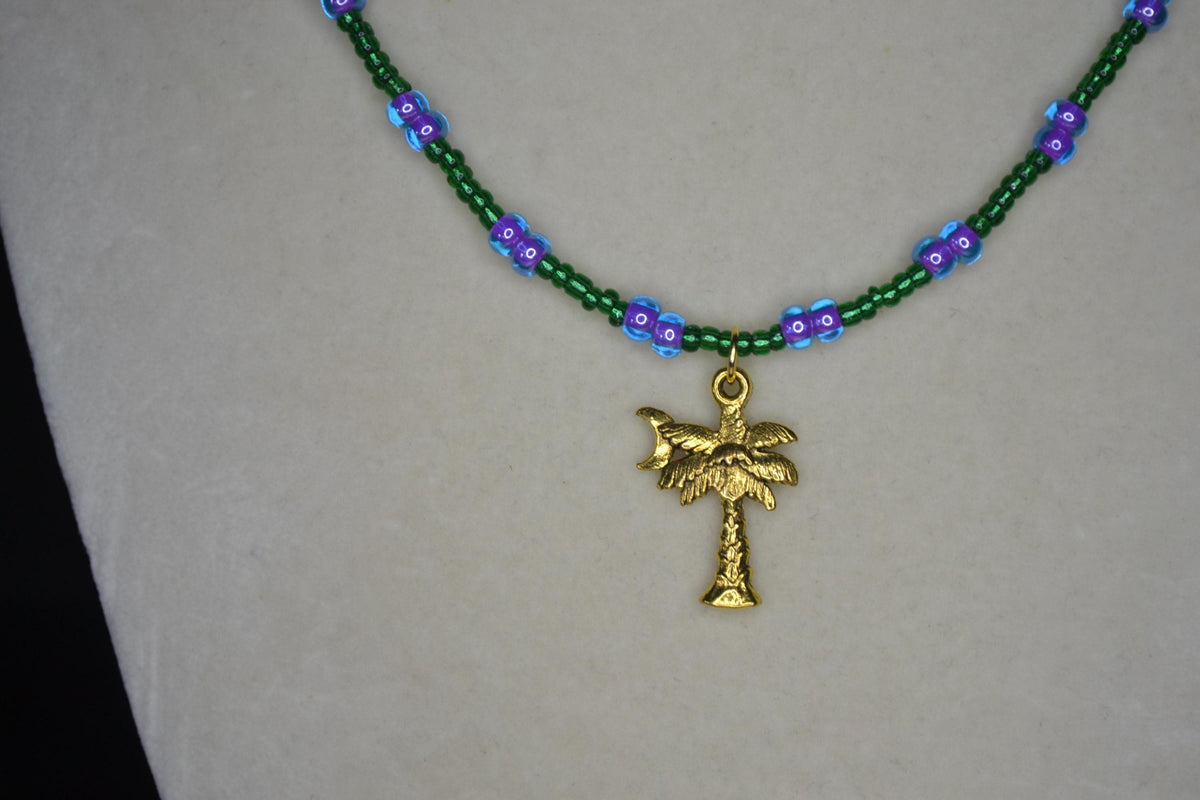 Gold Palm tree pendant glass bead choker. Green and blue violet