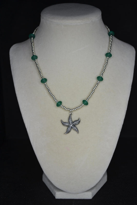 Silver starfish pendant glass bead necklace. Teal and silver