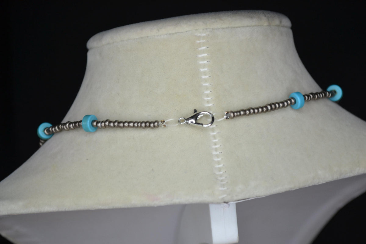 Silver swordfish pendant glass bead necklace. Metallic grey and turquoise