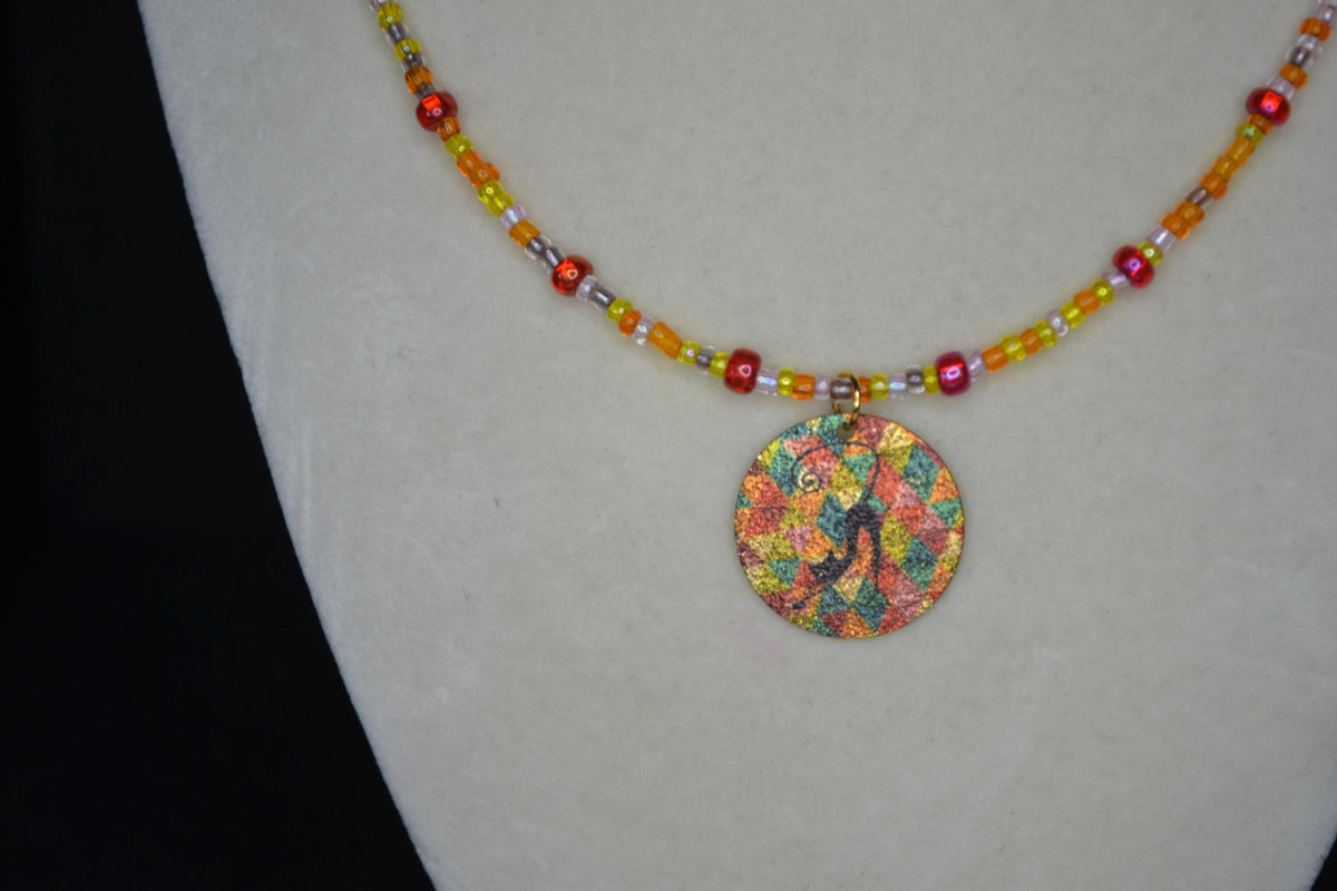 Vintage black cat pendant glass bead choker. Reds and oranges
